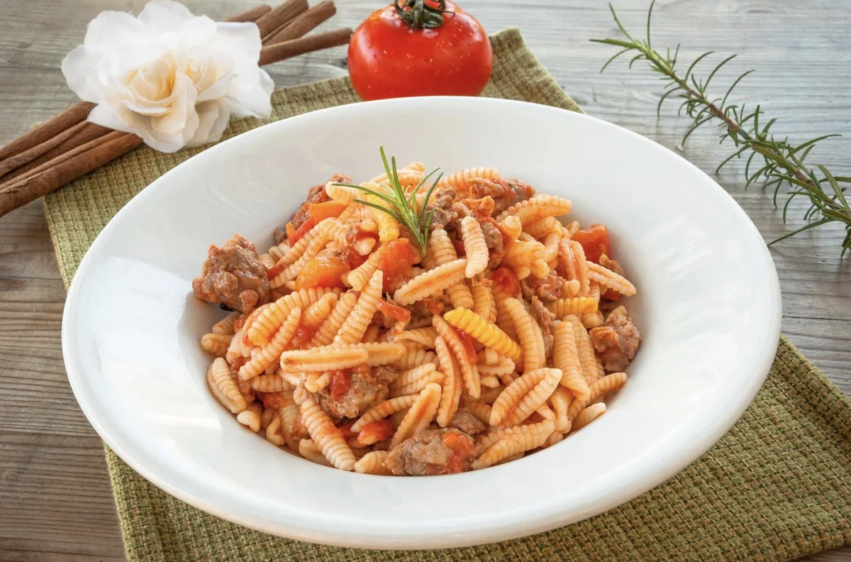 Malloreddus alla Campidanese with tomato sauce and Sardinian sausage